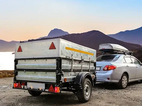 Путешествие за границу на автомобиле с прицепом: правила, документы, страховка