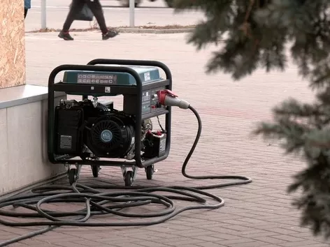 How do I find a place with a generator in my city during a power outage?