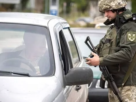 What documents from the TAC do men need to have to travel abroad?